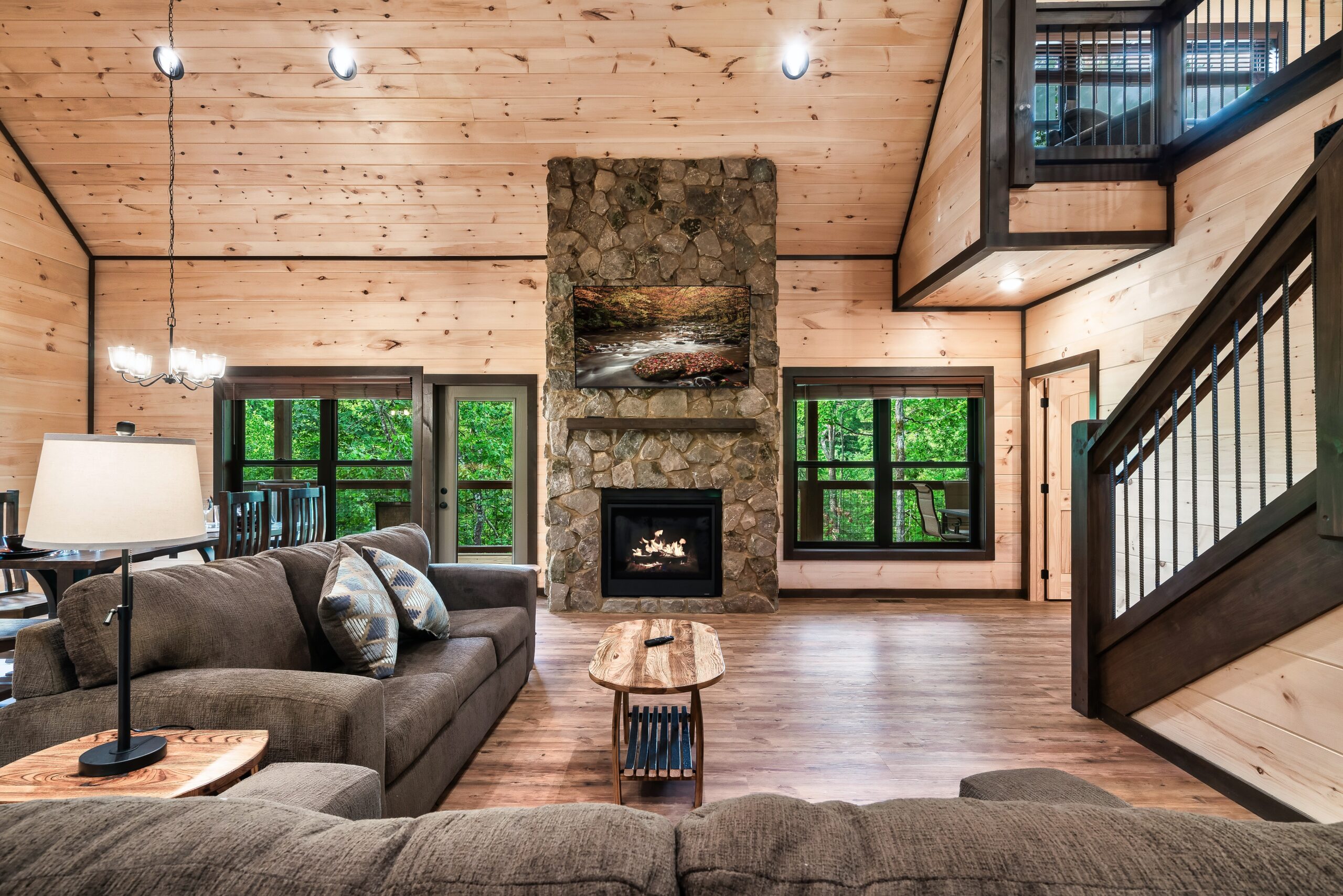 Mountain Rest Cabin living room with stone fireplace