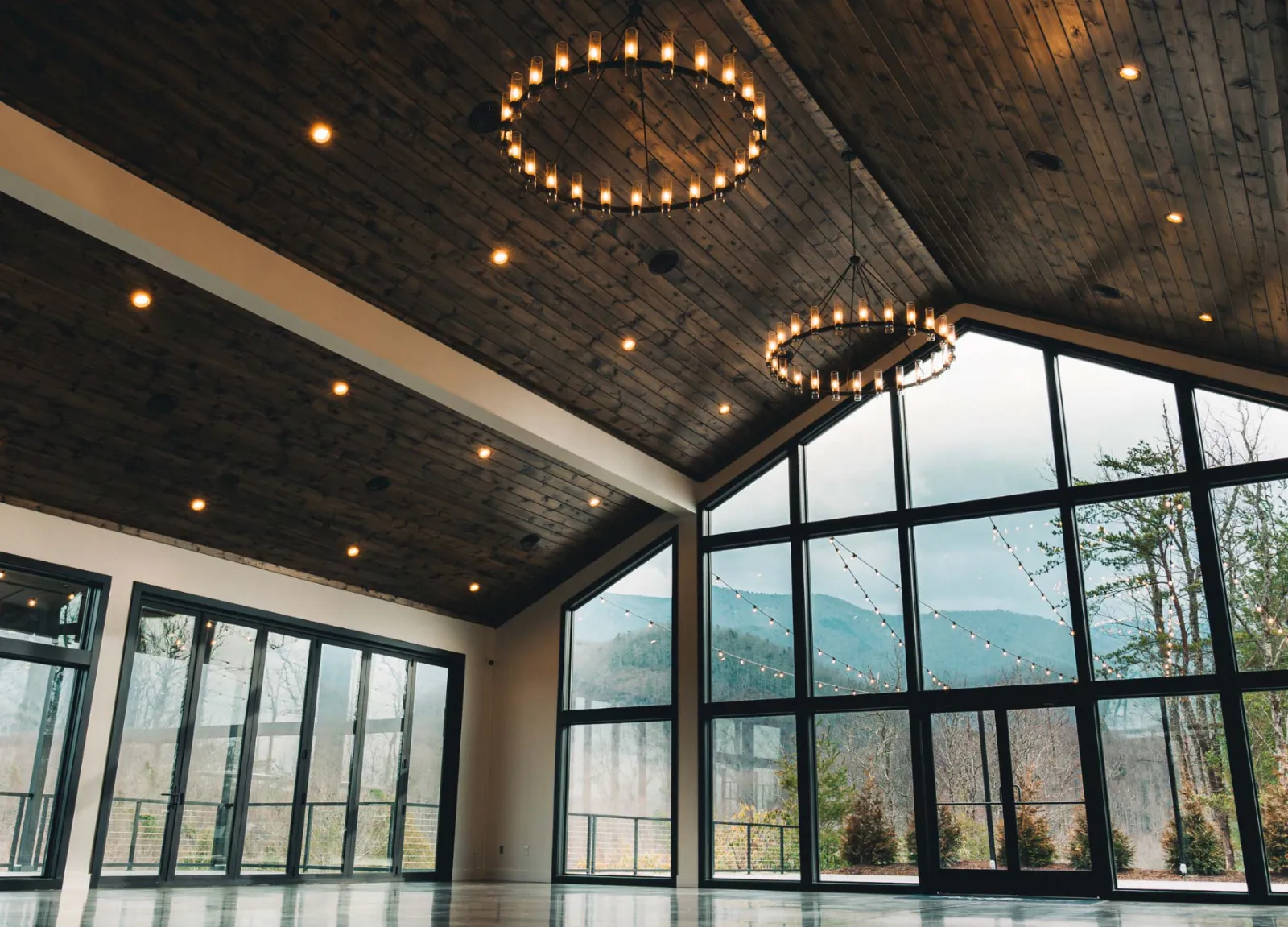 Grand Hall with full-glass walls and Smoky Mountain views